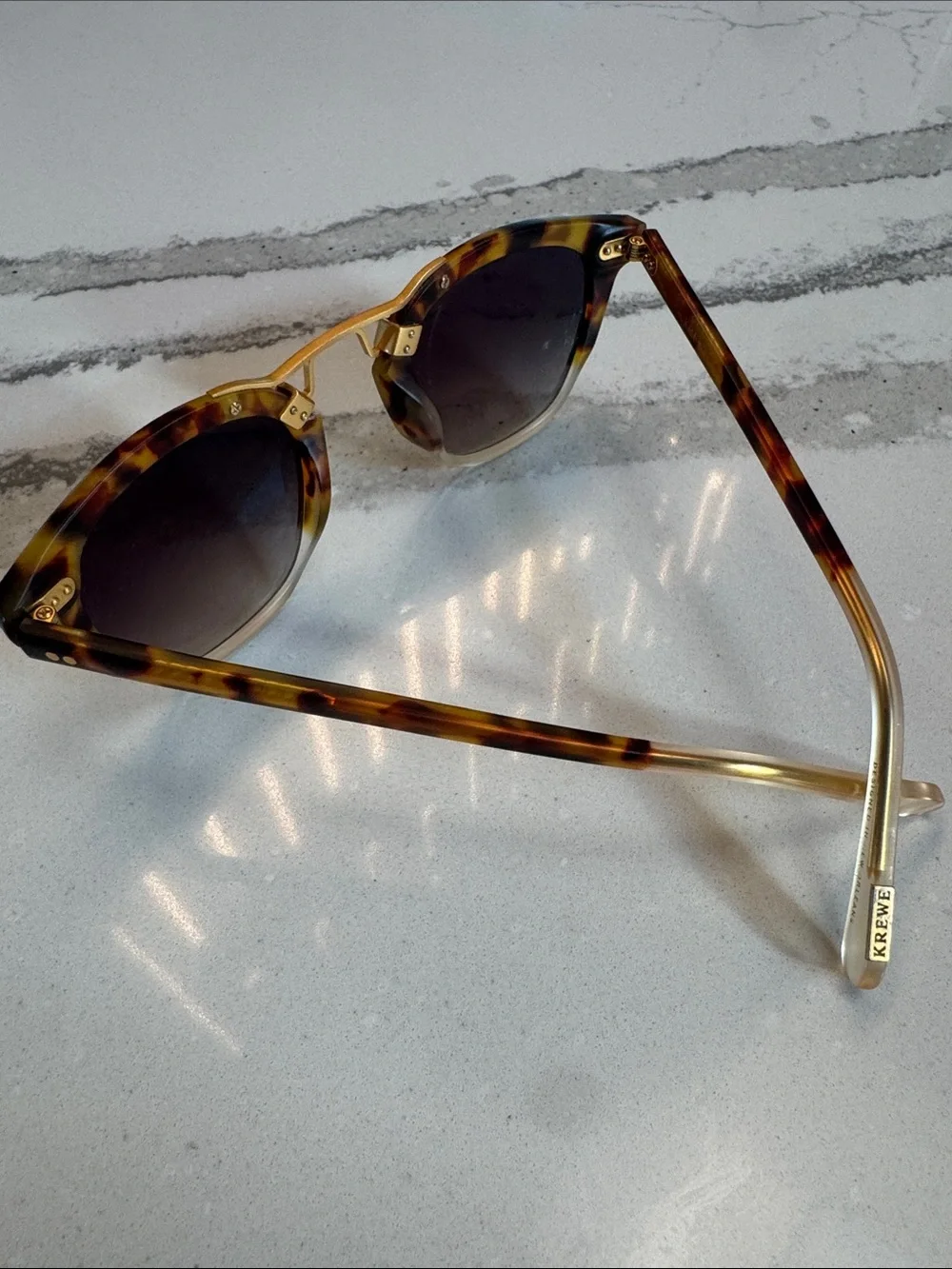 KREWE Tortoise Shell Sunglasses with Gold Bridge and Dark Gradient Lenses